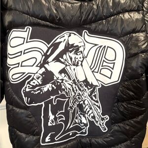 Black Puffer Jacket with Graphic Design